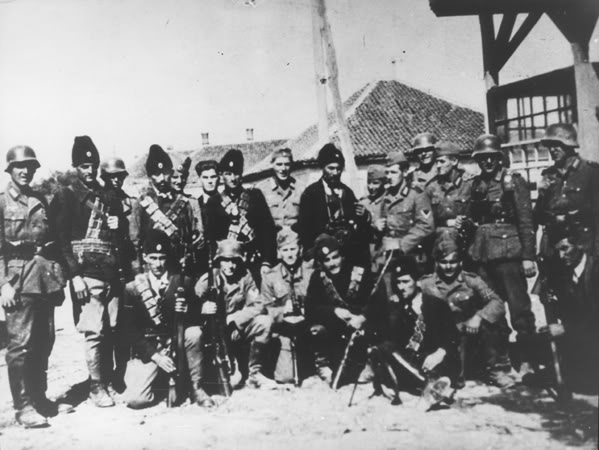 Photo of Serbian Chetniks and German Nazi Fascists. The entire army of Serbian Chetniks collaborated with Nazis. Serbia was a Nazi puppet state in World War II led by Milan Nedic, Serbian fascist collaborator. 