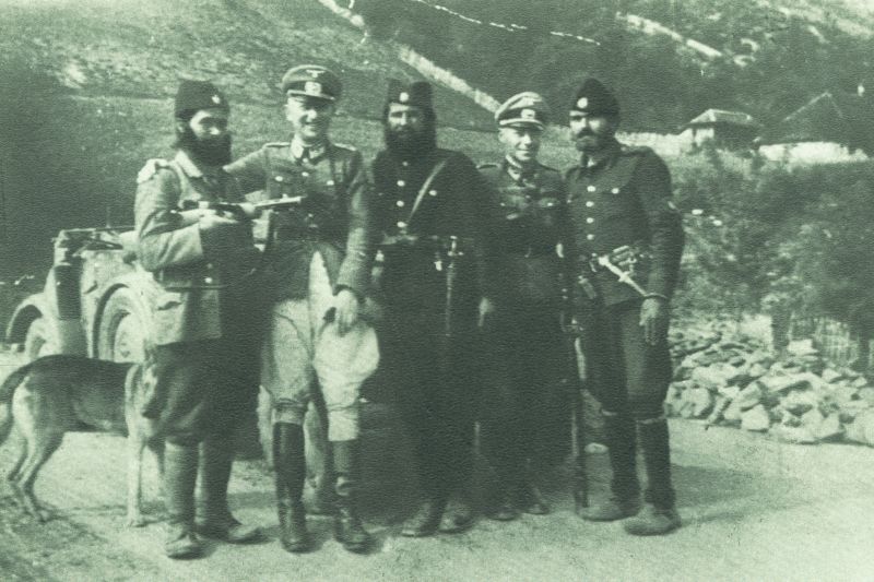 PHOTO: Serbian Chetniks with Nazi German Officers, Jablanica 1942. The Chetniks’ struggle with the invaders came to a complete stop at the end of 1941, and gradually evolved into cooperation with the Italian Fascists and the German Nazis. According to Yad Vashem Holocaust Memorial in Israel, 'As the Chetniks increased their cooperation with the Germans, their attitude toward the Jews in the areas under their control deteriorated, and they identified the Jews with the hated Communists. There were many instances of Chetniks murdering Jews or handing them over to the Germans.'