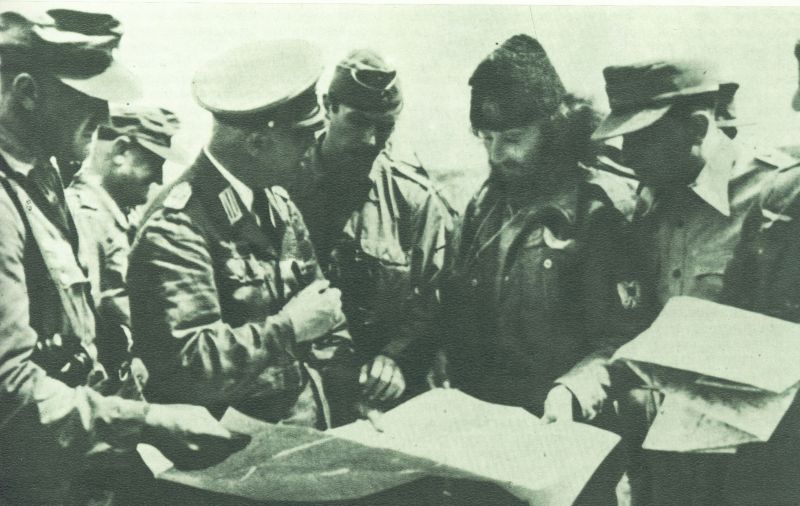 PHOTO: Serbian Chetniks with Nazi Germans, Zajecar 1944. The Chetniks’ struggle with the invaders came to a complete stop at the end of 1941, and gradually evolved into cooperation with the Italian Fascists and the German Nazis. According to Yad Vashem Holocaust Memorial in Israel, 'As the Chetniks increased their cooperation with the Germans, their attitude toward the Jews in the areas under their control deteriorated, and they identified the Jews with the hated Communists. There were many instances of Chetniks murdering Jews or handing them over to the Germans.'